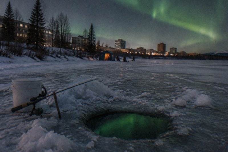 Aurora Borealis Viewing and Ice Fishing Adventure, a bookable Fairbanks northern lights and ice fishing tour